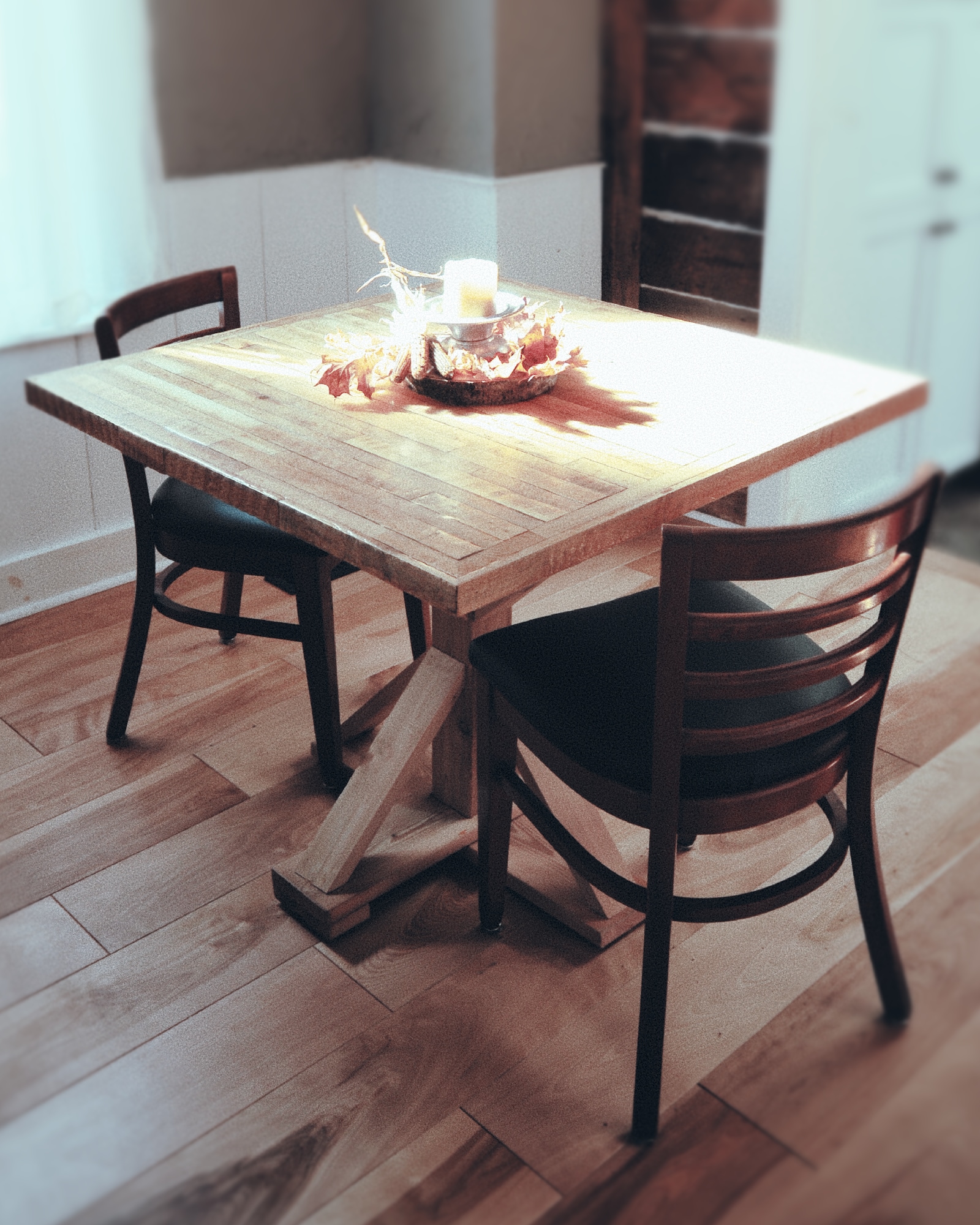 Person sitting on couch working on laptop