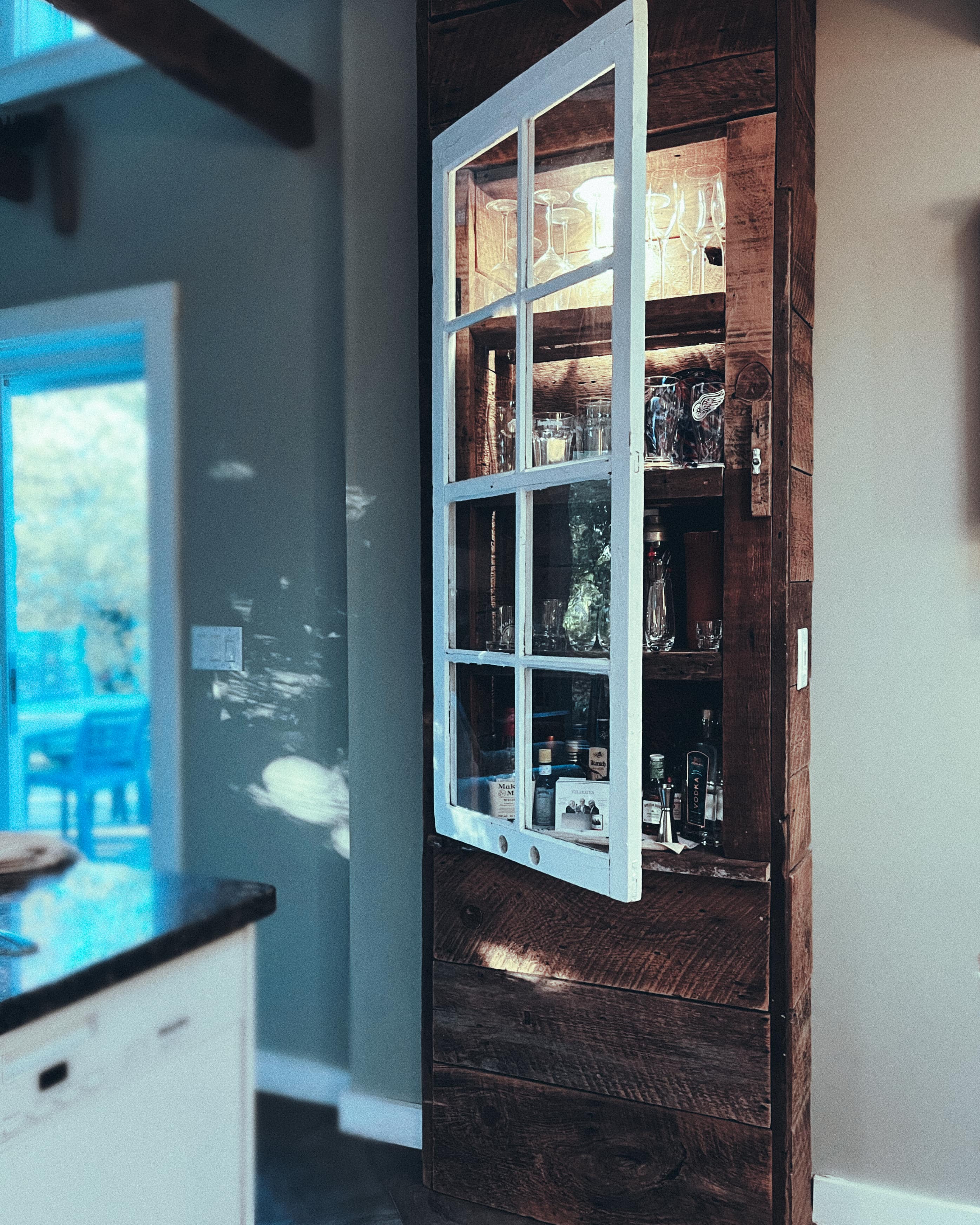 Person sitting by window working on tablet